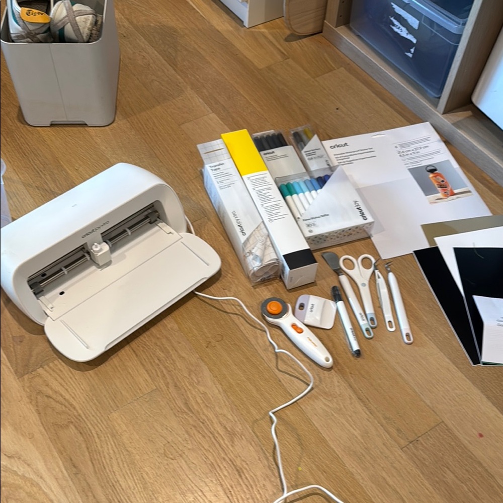Cricut White Crafting Machine with a ton of extras! Never used.